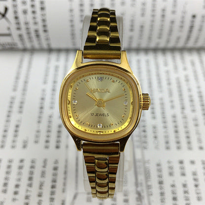 24mm SHANGHAI HAIDA lady watch with golden nail markers and champagne dial, manual mechanical movement.