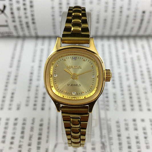 24mm SHANGHAI HAIDA lady watch with golden nail markers and champagne dial, manual mechanical movement.