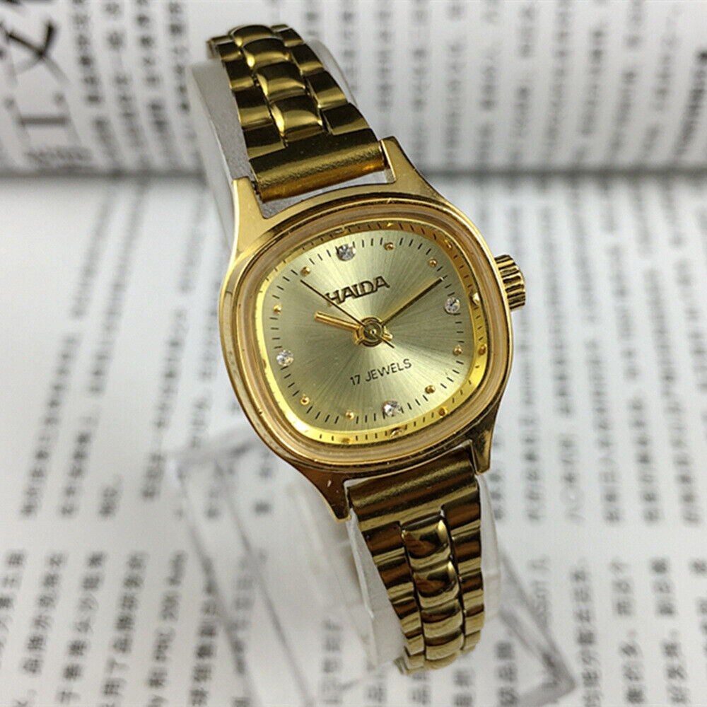 24mm SHANGHAI HAIDA lady watch with golden nail markers, champagne dial, manual mechanical movement.