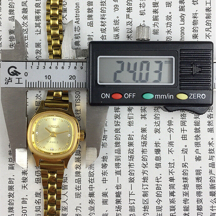 24mm SHANGHAI HAIDA lady watch with champagne dial and golden nail markers, manual mechanical movement.