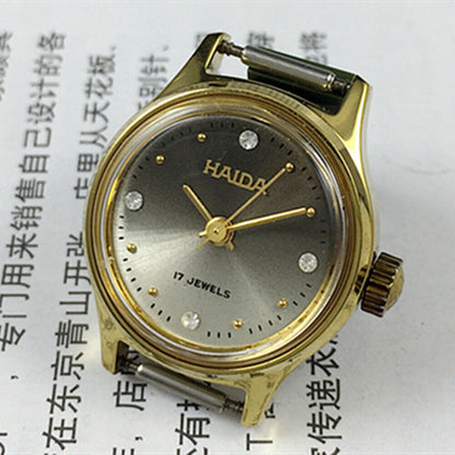 SHANGHAI HAIDA Montre mécanique manuelle pour femme, boîtier doré, imitation diamant, clou