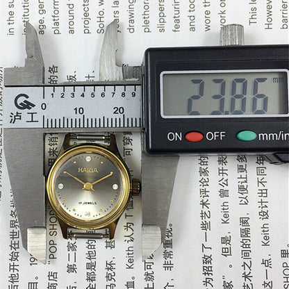 SHANGHAI HAIDA Montre mécanique manuelle pour femme, boîtier doré, imitation diamant, clou