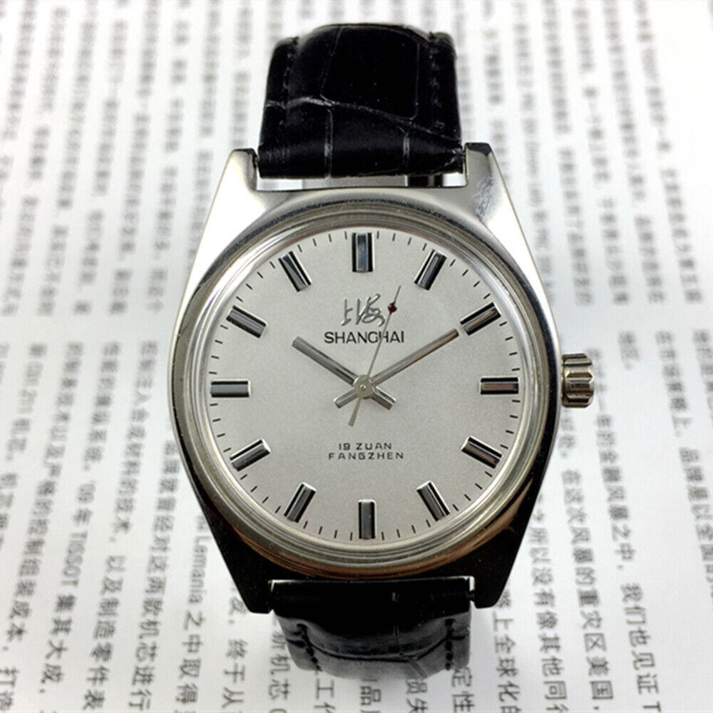 Shanghai Factory 38mm manual mechanical watch with white dial, 3 hands, 19 jewels for precise timekeeping and classic style