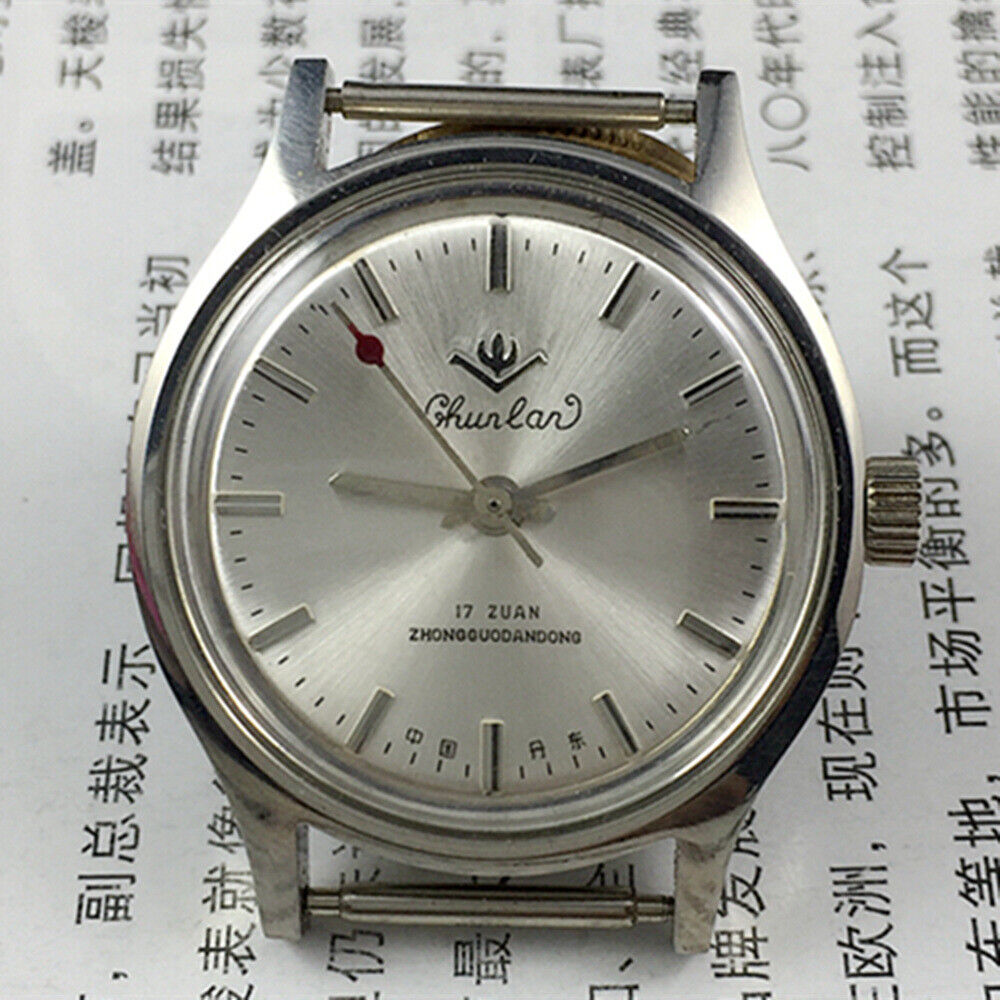 Chunlan 32mm manual mechanical watch with 17 jewels, silver dial, and silver nail markers.