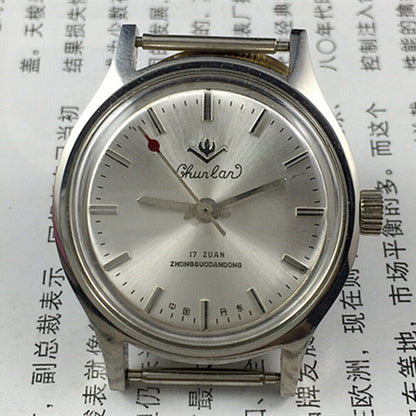 Chunlan 32mm manual mechanical watch with 17 jewels, silver dial, and silver nail markers.