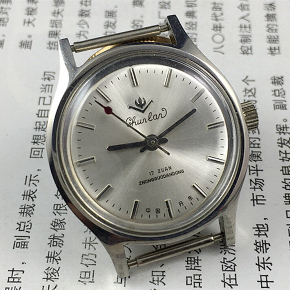 Chunlan 32mm manual mechanical watch with 17 jewels, silver dial, and silver nail markers.