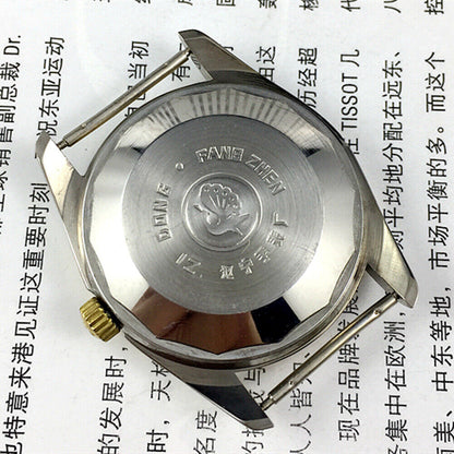 Dandong Peacock 37mm watch with golden dial, manual mechanical movement, 33 jewels, single calendar display.