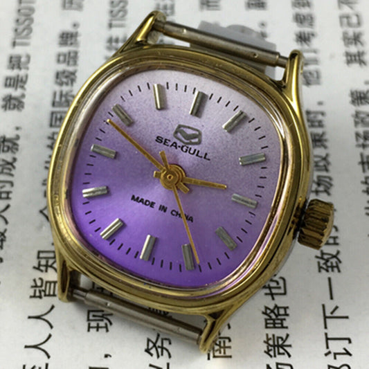 Seagull 27mm purple dial ladies watch with square case and manual mechanical movement.