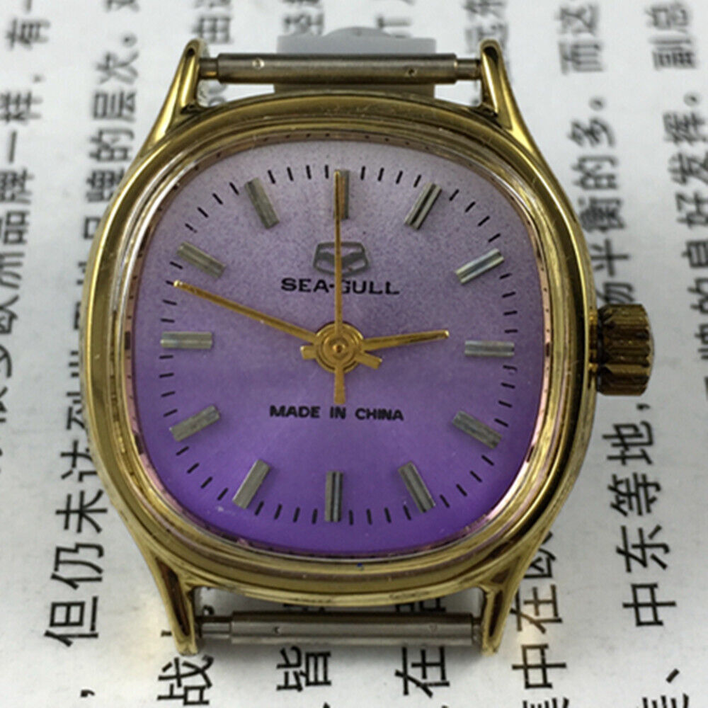 Seagull ladies watch with 27mm purple dial, square case, and manual mechanical movement, elegant design.