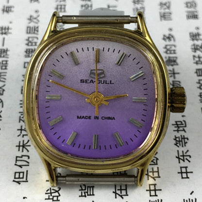 Seagull ladies watch with 27mm purple dial, square case, and manual mechanical movement, elegant design.