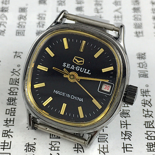 26mm black square Seagull ladies watch with manual mechanical movement and single calendar display.