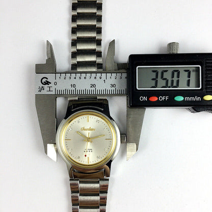 Chunlan 33mm manual watch with silver dial, steel band, 17 jewels, classic mechanical timepiece.