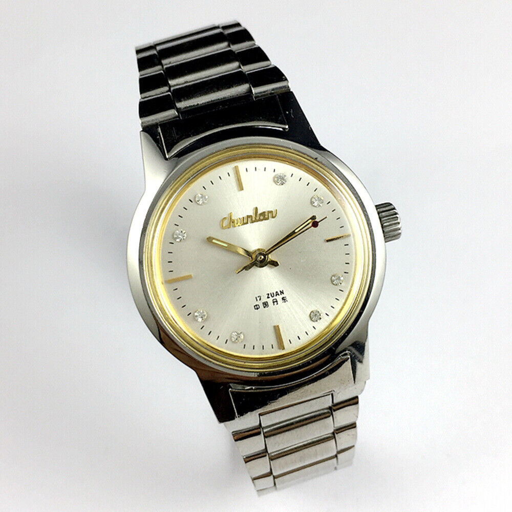 Chunlan 33mm manual mechanical watch with silver dial, steel band, and 17 jewels in a classic style.