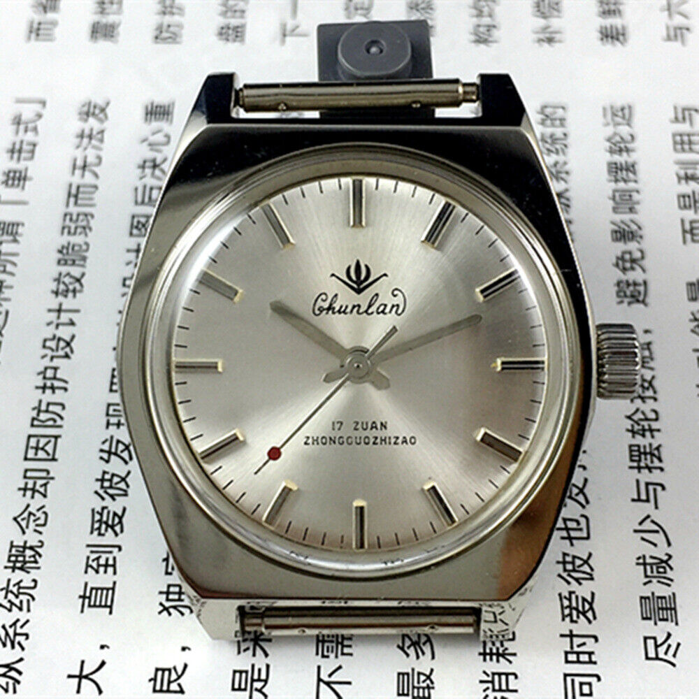 33mm Chunlan manual mechanical watch with silver dial and 17 jewels, paired with a steel watch band.