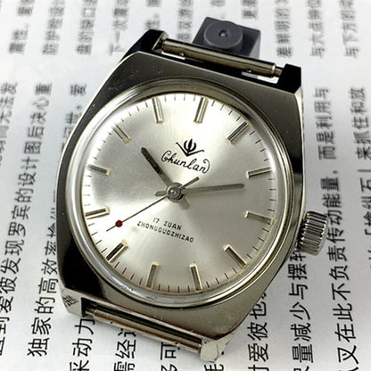 China Chunlan 33mm manual mechanical watch with silver dial, 17 jewels, and stainless steel band for classic style and precision.
