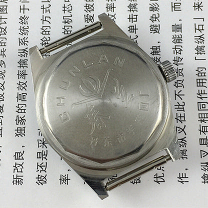 33mm Chunlan manual mechanical watch with silver dial, 17 jewels, and durable steel band for everyday wear.