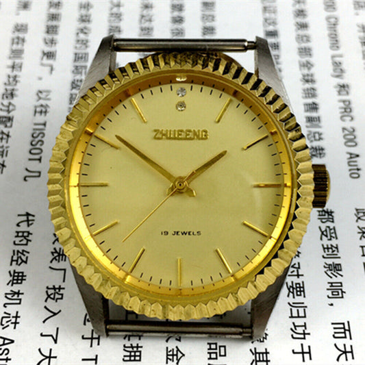 36mm golden round case Tianjin manual mechanical ladies watch with stylish band for elegant wear.