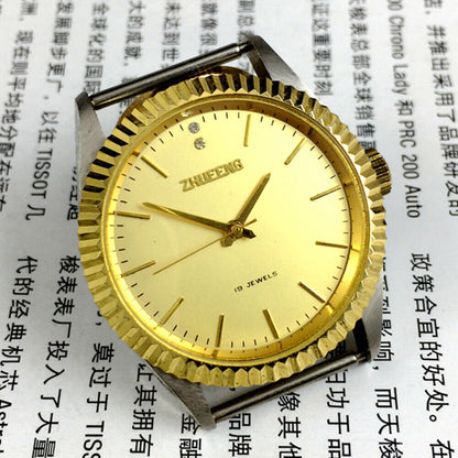 36mm Tianjin manual mechanical ladies watch with golden round case and elegant band for stylish wear.