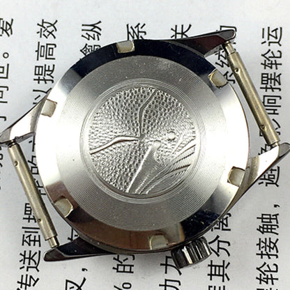 Elegant 26mm Seagull ladies watch with black round case, golden nail markers, and manual mechanical movement.