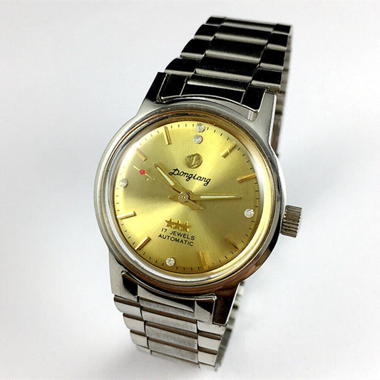 China Donglang Steel automatic mechanical watch with 17 jewels, golden dial, and matching steel band.