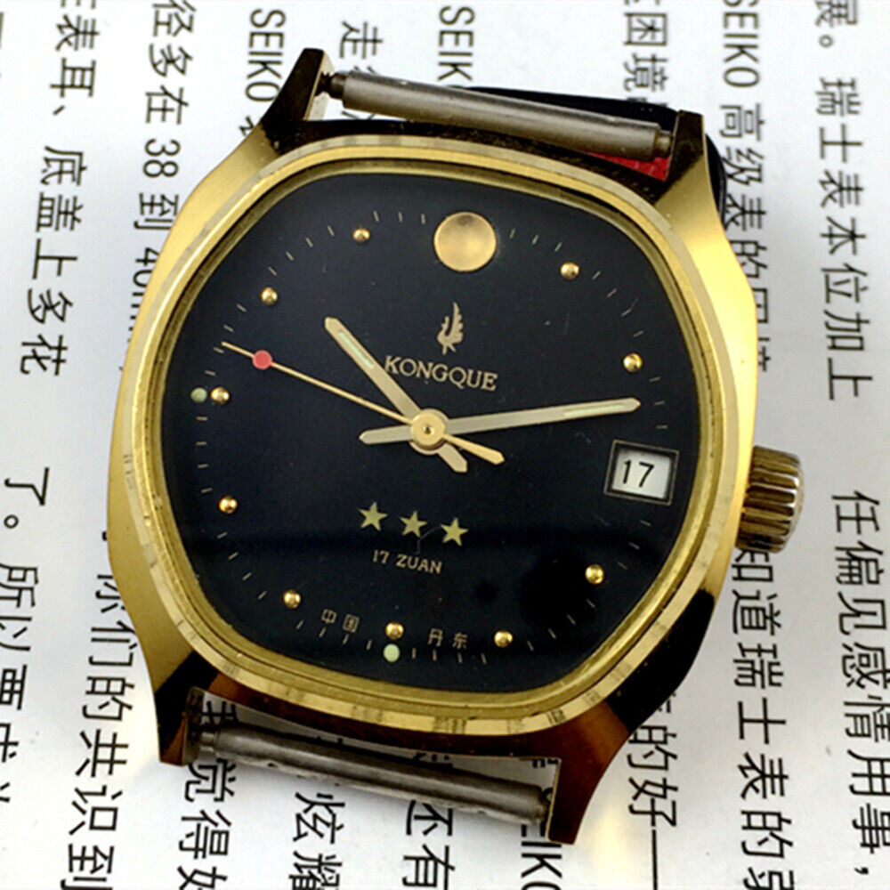 China Kongque Steel manual mechanical watch, 17 jewels, black dial, gold case for elegant style and precision.