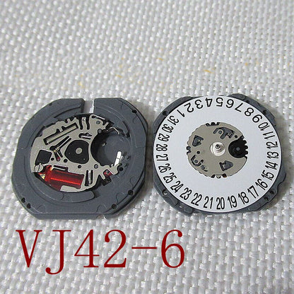 Hattori Epson TMI VJ42 watch quartz movement with date at 3 and 6, Japan made precision mechanism.