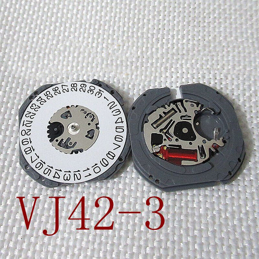 Hattori Epson TMI VJ42 watch quartz movement with date at 3 and 6, Japan made precision mechanism.