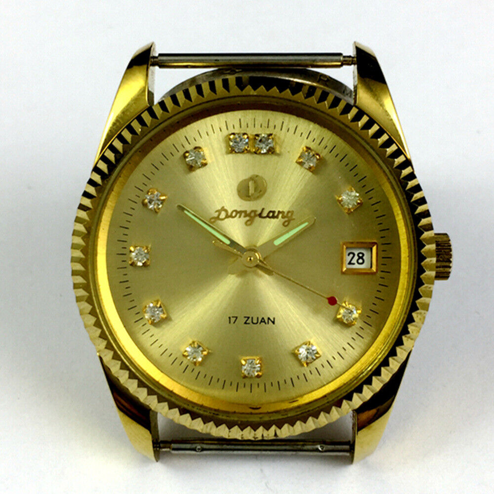 Donglang 36mm manual mechanical watch with golden dial, 17 jewels, single calendar feature.
