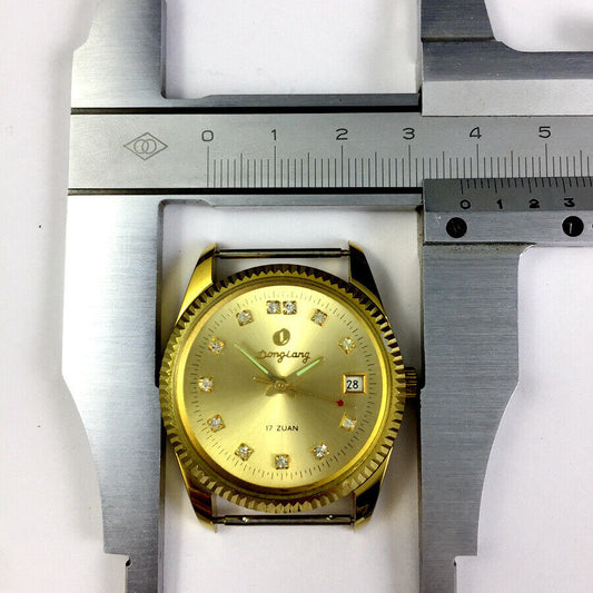 Donglang 36mm manual mechanical watch with golden dial, 17 jewels, single calendar feature.