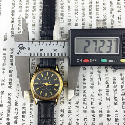 Tianjin Seagull ladies watch with black round case, golden nail markers, and manual mechanical movement.