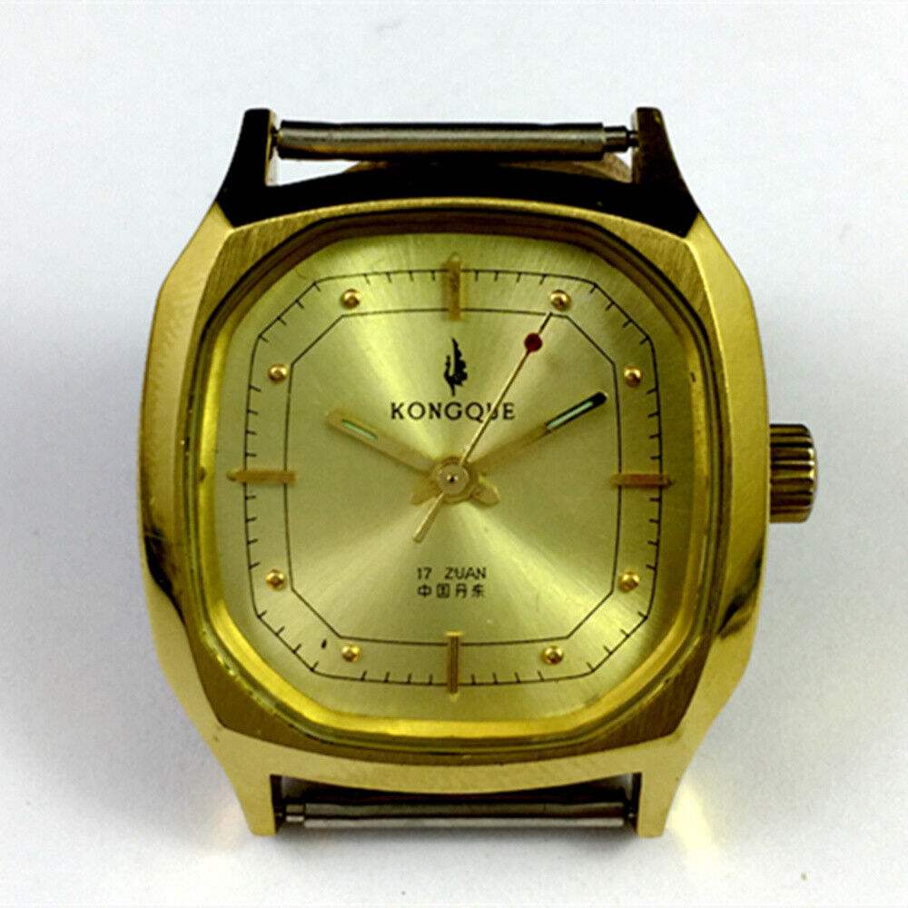 China Kongque 34mm manual steel watch with 17 jewels, golden dial, and nail markers for elegant style.