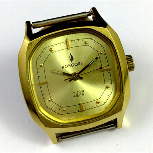 China Kongque 34mm manual steel watch with 17 jewels, golden dial, and nail markers for elegant style.