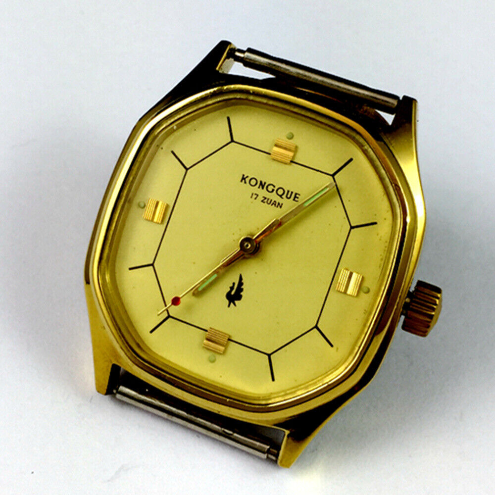 China Kongque 35mm manual mechanical watch with 17 jewels, golden luminous dial, and three-hand display.