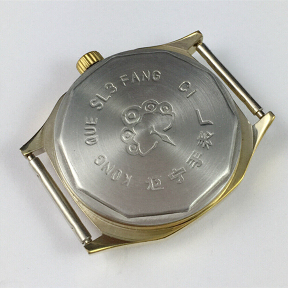 China Kongque 35mm manual mechanical watch with 17 jewels, golden dial, luminous hands for precise time reading.