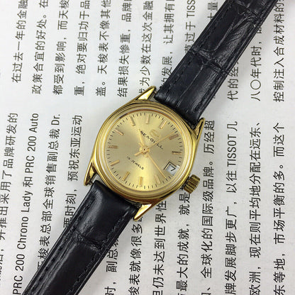 Montre mécanique à cadran rond pour femme, cadran doré, calendrier simple, motif mouette