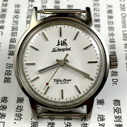 32mm Shanghai Factory manual mechanical watch with 19 jewels, shock-resistant design for durability.
