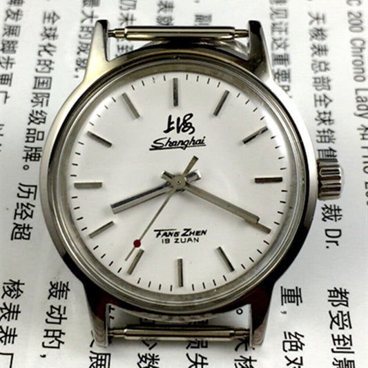 32mm Shanghai Factory manual mechanical watch with 19 jewels, shock-resistant design for durability.