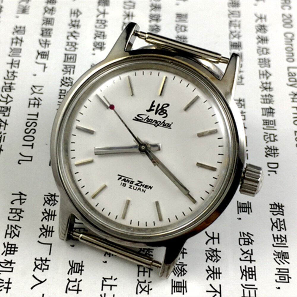 32mm Shanghai Factory manual mechanical watch with 19 jewels and shock-resistant design, ideal for everyday use.
