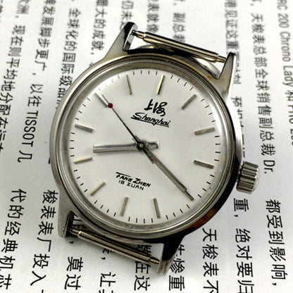32mm Shanghai Factory manual mechanical watch with 19 jewels and shock-resistant design, ideal for everyday use.