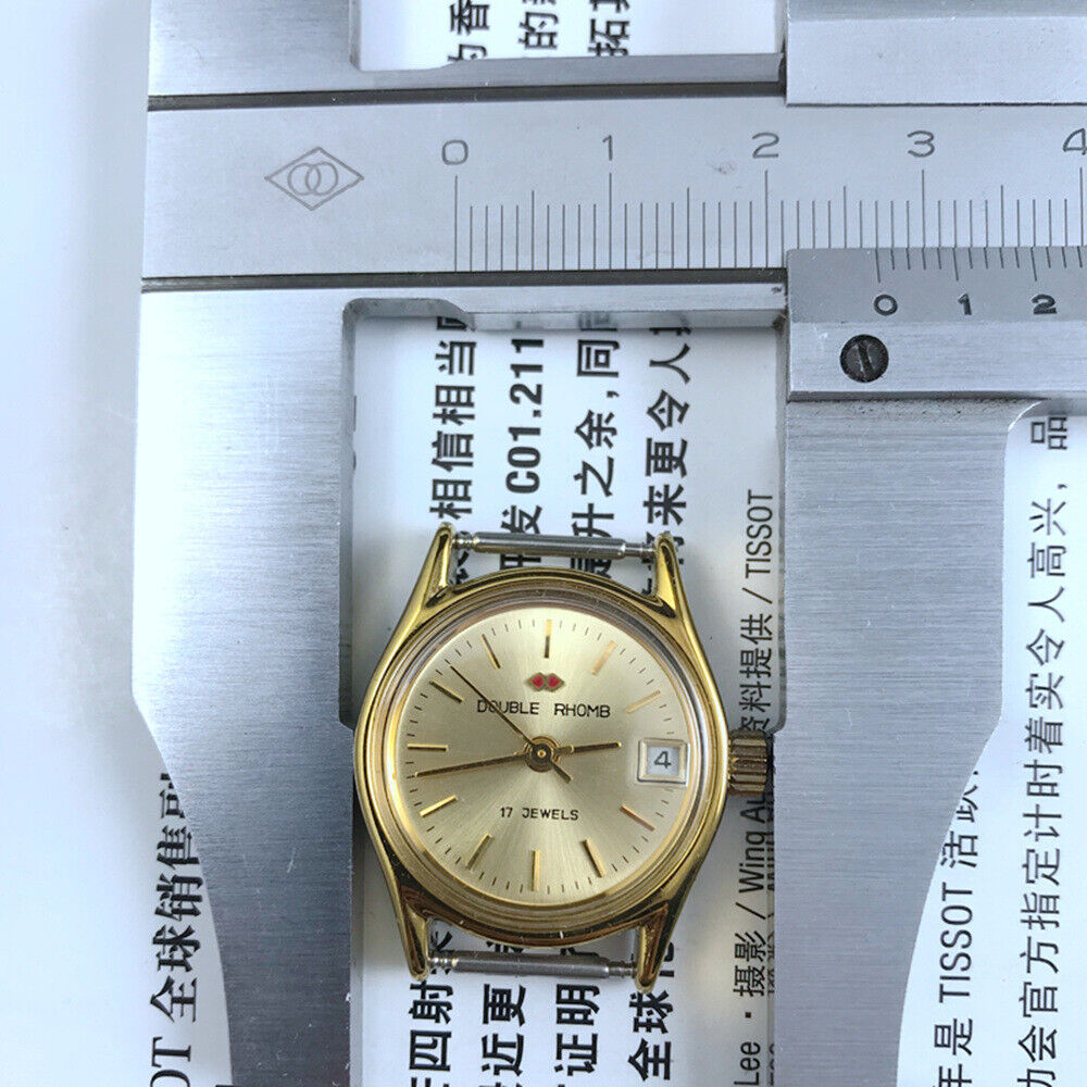 Double Rhomb golden nail lady watch with manual mechanical movement and single calendar display in elegant case
