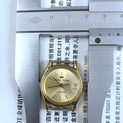 Double Rhomb golden nail lady watch with manual mechanical movement and single calendar display in elegant case