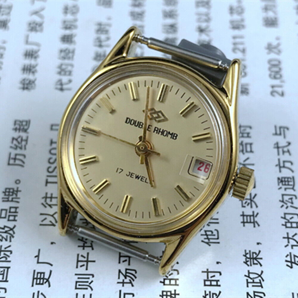 Double Rhomb Lady Watch with golden nail markers and manual mechanical movement, featuring a single calendar and elegant 3-hand design by Double Rhomb.