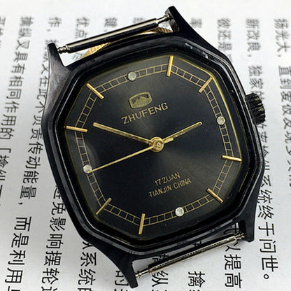 Zhufeng black octagonal watch with gold accents, manual mechanical movement, elegant unisex design.