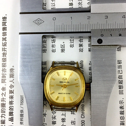 27mm square golden nail case lady watch by Tianjin Seagull, manual mechanical movement, elegant design