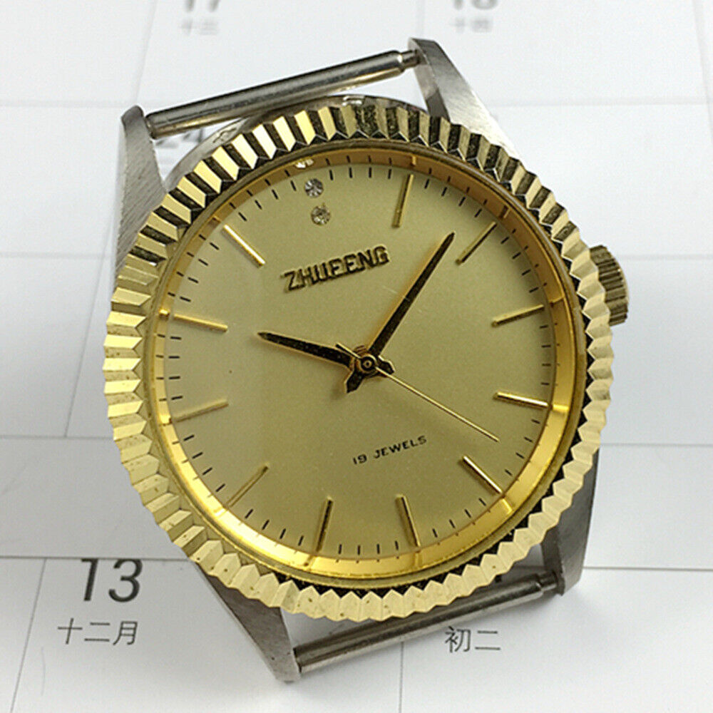 Zhufeng 36mm manual mechanical watch with golden round case and nail indices for classic elegance.