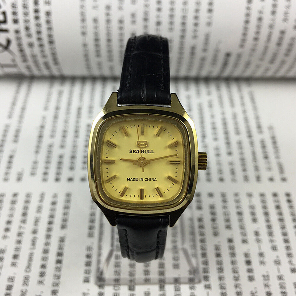 Tianjin Seagull 27mm ladies watch with golden square case and mechanical movement, elegant style.