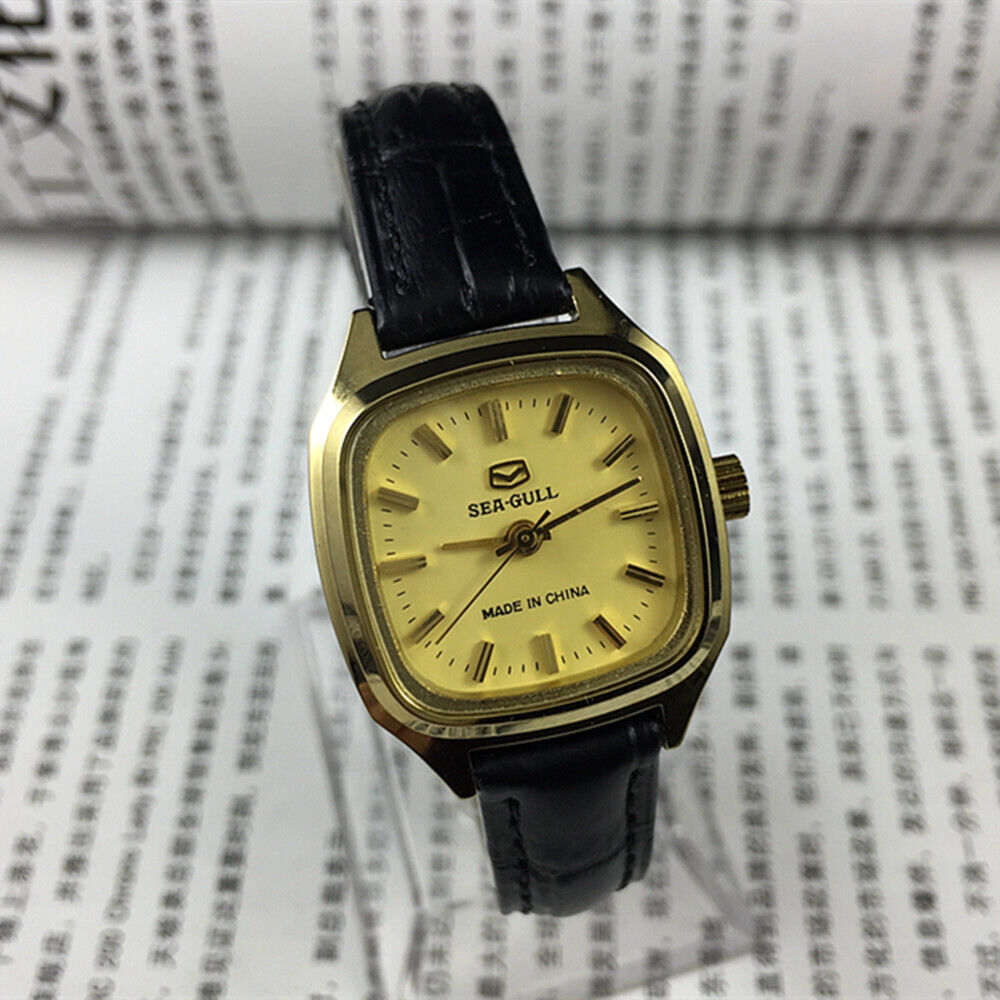 Tianjin Seagull 27mm ladies watch with golden case, mechanical movement, and elegant square dial design