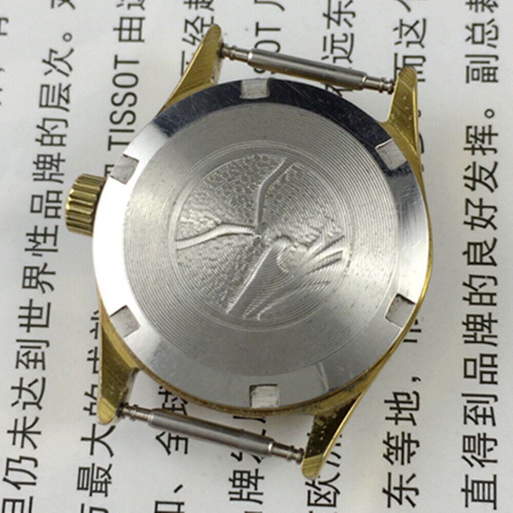 27mm round gold-tone Tianjin Seagull ladies watch with manual movement and elegant nail hour markers on white dial.