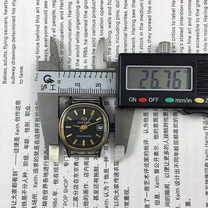 26mm Seagull manual mechanical lady watch with black case and gold markers, single calendar design.