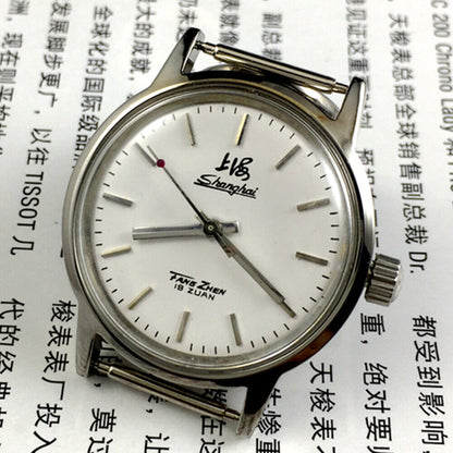 Silver 32mm Shanghai Factory manual mechanical watch with silver case and nail markers, classic design